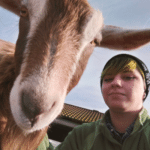 Surrey Docks Farm Volunteering - Kelly with a goat