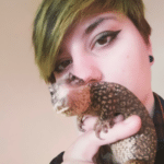 Kelly and her monitor lizard