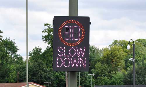 SLR Vehicle Activated Speed Sign by Messagemaker Dispalys - Showing 30mph in a red roundel and the text SLOW DOWN