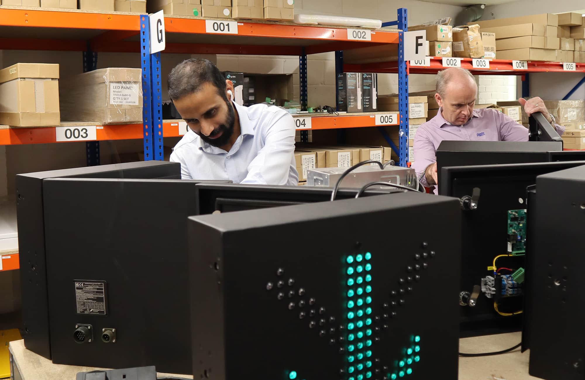 Santosh and Neil on LC signs Santosh and Neil on Lane Control signs